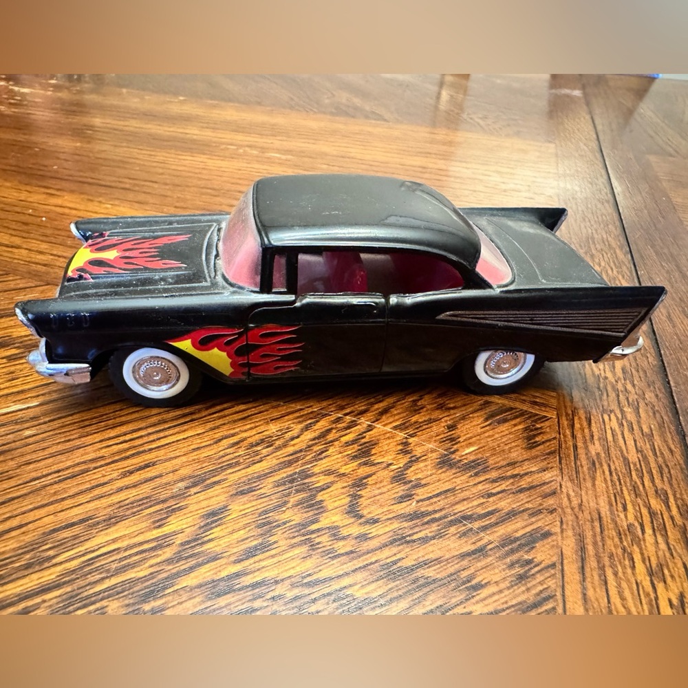 Classic Black Toy Car with Red Flames